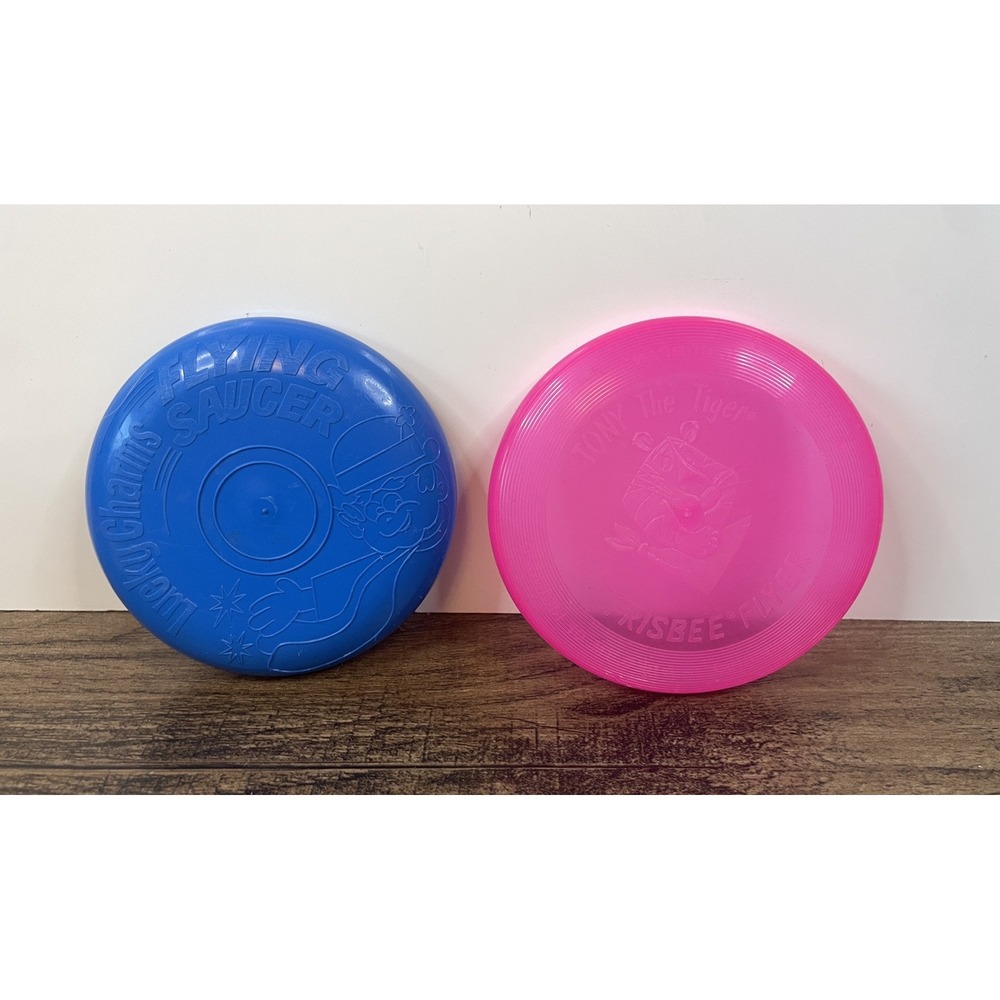 Lot Of 2 Kelloggs Frisbee Discs Flying Sauces Tony The Tiger Lucky Charms